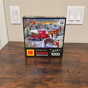 Kodak Premium Puzzle with Red Truck and Snowy Cabin
